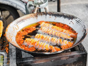 Fried dough in a pan, colorful appetizing, local food, southern thailand