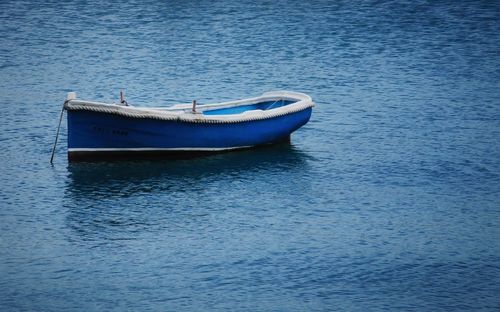 Boat moored in sea