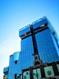 Low angle view of built structure against blue sky