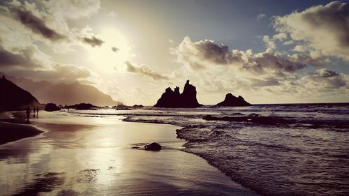 Scenic view of sea against sky at sunset