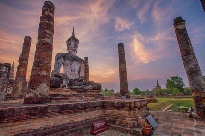 Statue of temple against sky