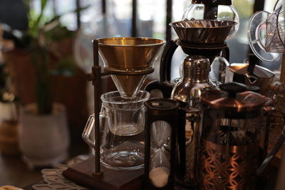 Close-up of coffee maker on table