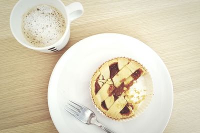 Close-up of coffee cup on table