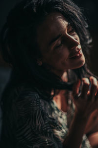 Close-up portrait of woman looking away