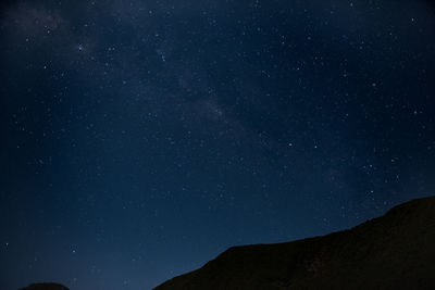 Low angle view of star field against sky at night