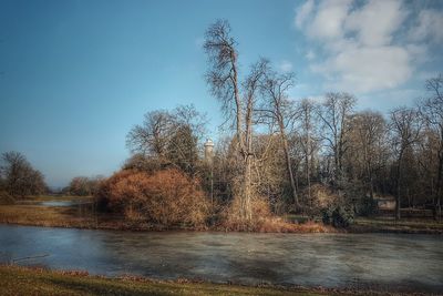 Scenic view of lake against sky during autumn