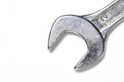 Close-up of metallic structure against white background