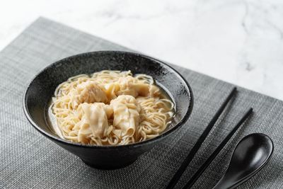 High angle view of noodles in bowl on table