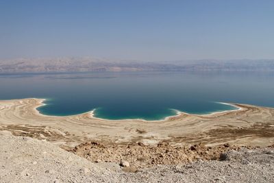 Scenic view of lake against blue sky