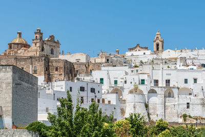 Buildings against blue sky