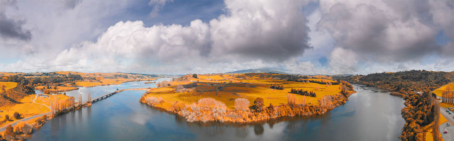 Panoramic view of waterfall against sky