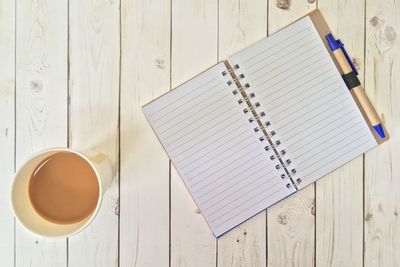 High angle view of coffee cup on table