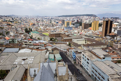 Aerial view of cityscape against sky