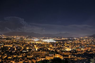 Aerial view of illuminated cityscape