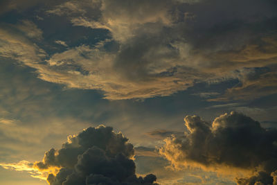 Low angle view of dramatic sky during sunset