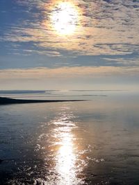 Scenic view of sea against sky at sunset