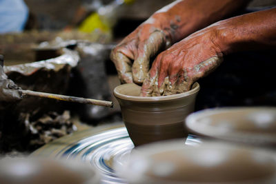 Close-up of person preparing food