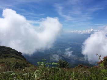 Scenic view of clouds over mountain