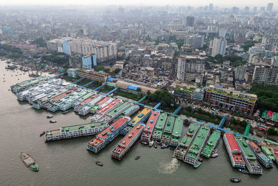 High angle view of illuminated buildings in city