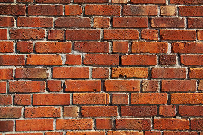 Old red brick wall as texture