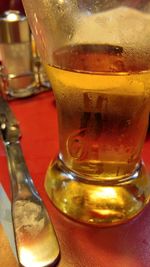 Close-up of beer on table