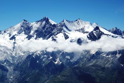 Scenic view of mountains against clear sky