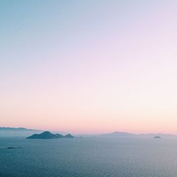 Scenic view of sea against sky at sunset