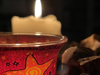 Close-up of tea light candle on table