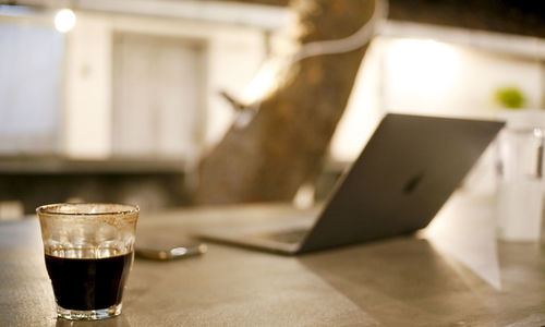 Close-up of beer glass on table