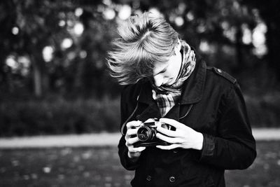 Woman standing in park