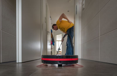 Man working on floor at home