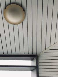 Low angle view of light fixture on ceiling