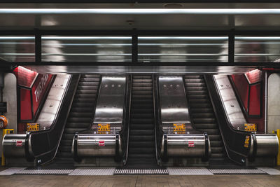 Escalators in illuminated building