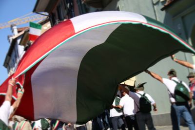 Close-up of flag in city