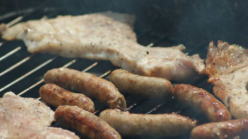 Close-up of meat on barbecue grill