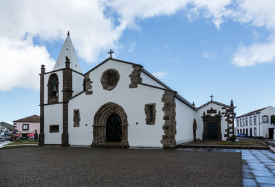 Facade of church against sky