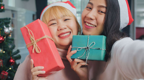 Portrait of happy girl holding hands