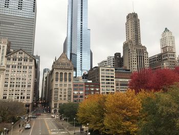 Buildings in city against sky