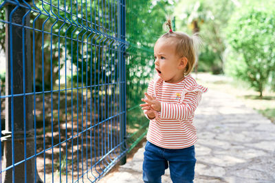 Cute girl standing outdoors