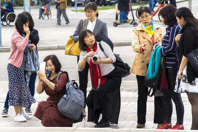 People on street in city