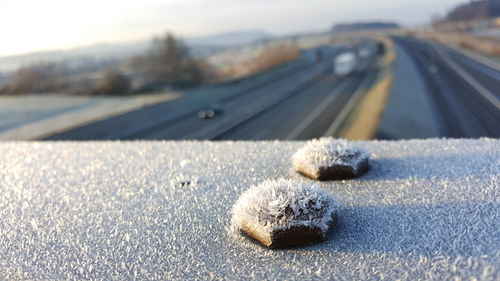 High angle view of railing covered with frost