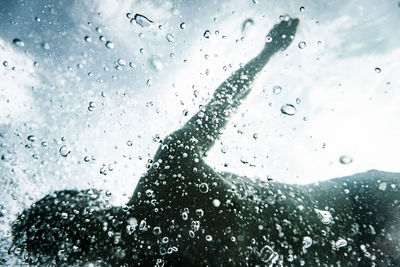 Person swimming underwater