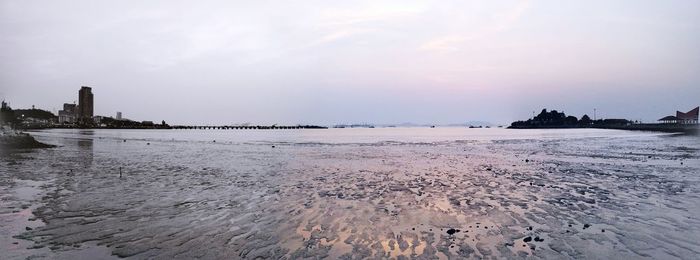 Scenic view of beach against sky