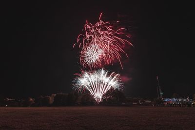 Firework display at night