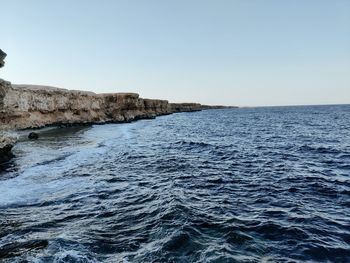 Scenic view of sea against clear sky