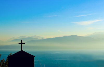 Scenic view of sea against blue sky