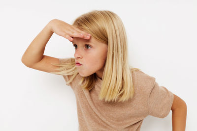 Young woman against white background