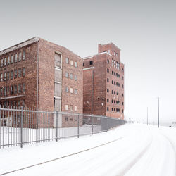 View of building against clear sky during winter