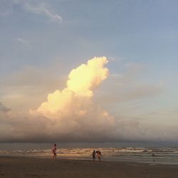 Scenic view of sea against cloudy sky