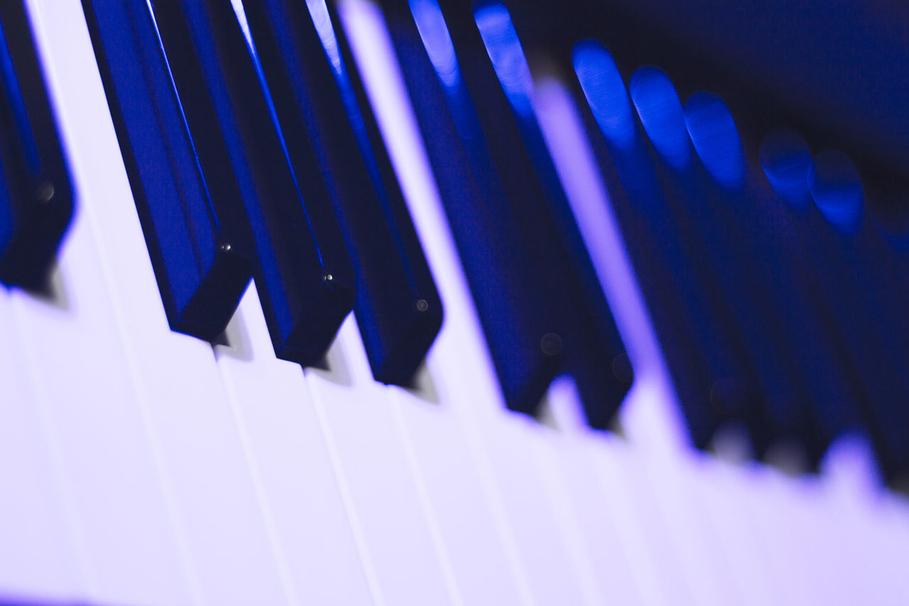 blue, piano, music, musical instrument, arts culture and entertainment, musical equipment, piano key, close-up, keyboard, no people, keyboard instrument, musical keyboard, electronic device, indoors, in a row, white, string instrument, selective focus